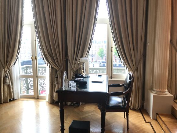 Work desk next to balcony doors