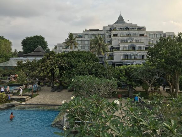 Location of the main pool versus the hotel building