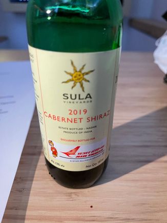Only alcohol options were Red / White and Beer.  A semi decent bottle of Sula sufficient. 