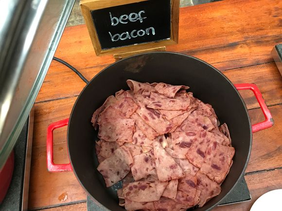 Beef bacon : 
pork bacon is available from around the corner behind the screen as not to upset local sentiment