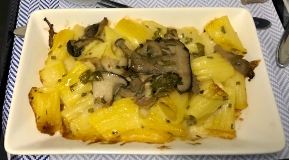 Truffle mac and cheese with garlic sautéed wild mushrooms