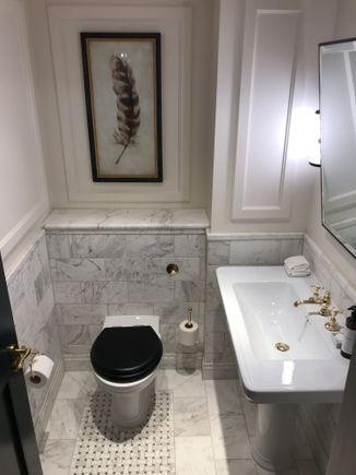 Upon entry turn left and find the extra toilet (motion sensor activated light)