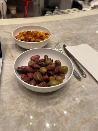 Bar snacks — nuts and olives. 