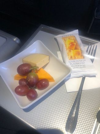 I asked if they had a spare cheese plate once they’d served the cabin. The smoked cheese was ok but the orange one less so. Not sure I’d be taking this over the sundae tbh. 