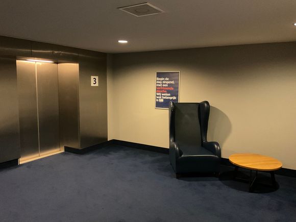 Elevator lobby on each floor - here you can notice that the hotel is converted from an office