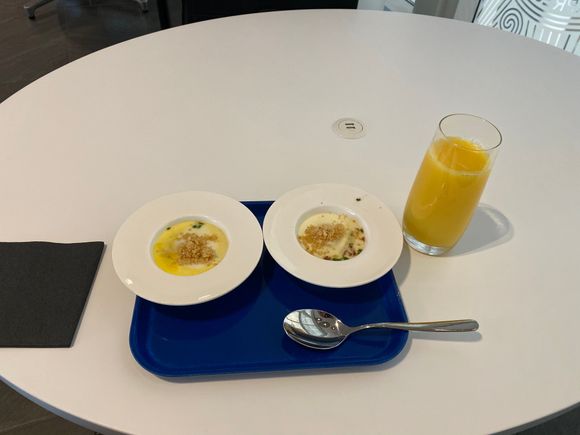 Poached eggs and OJ in the Centurion....