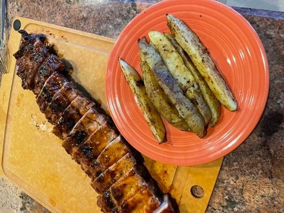 Grilled Baby back ribs and crispy potato wedges