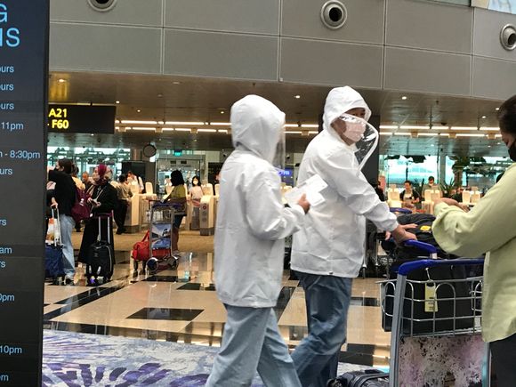 And yes masks are enforced at Singapore airport but then again some maskes are more obvious then others as in hazz-mat outfits