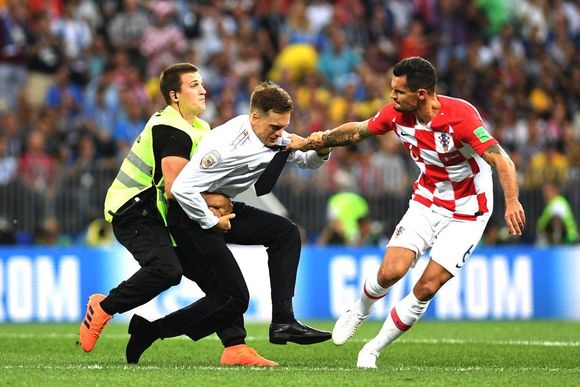 Pussy Riot  pitch invader and Lovren :-)