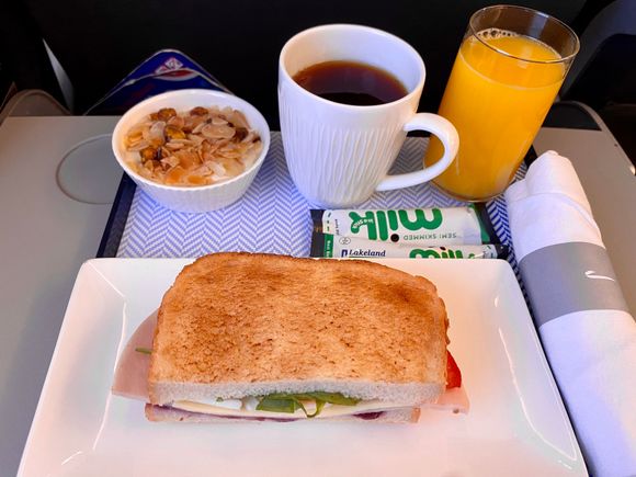 Band 1 brunch: Turkey, emmental and egg toasted sandwich, honey yogurt with almond and pistachio granola, freshly squeezed orange juice.