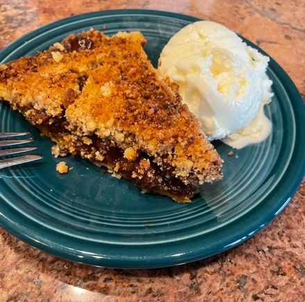 I had made a pie to go with dinner, but lunch was late so the pie [I]was[/I] dinner. Raisin a la mode. One of my all time favorites. 