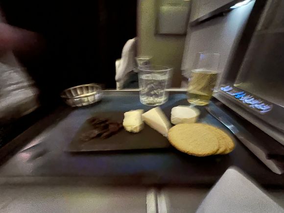 Todays cheese plate. Not as good as the outbound one. Sorry the photo is blurred. 