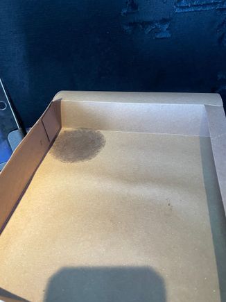 What is this round stain?  The dressing container made of compostable material was “dry” on bottom