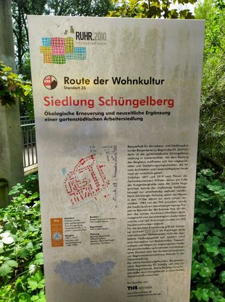 A large signpost explaining the origins of the Schüngelberg settlement 