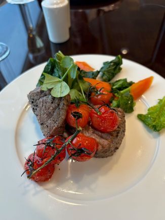 beautifully cooked steak in the Emirates Glasgow lounge 