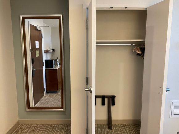 Closet space next to suite entrance