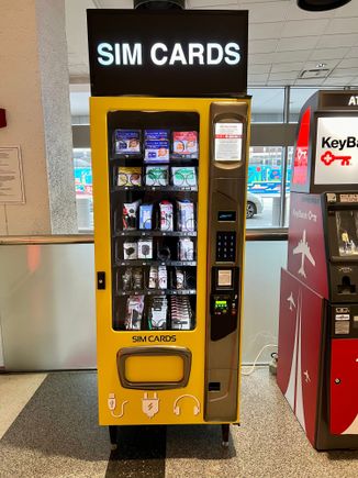 A SIM card vending machine outside of security-very helpful for foreign visitors. 