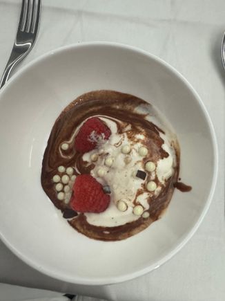 Partner asked cabin crew to suggest a dessert, and they said he should try the chocolate bar. A few minutes later this turned up. Confused he ate the fairly melted ice cream and enjoyed.