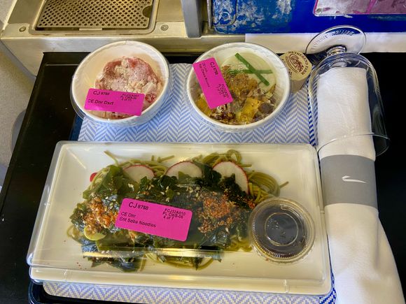 Band 1 cold dinner: blue cheese mousse with apple jelly and walnut slaw; green tea soba noodles with wakame salad