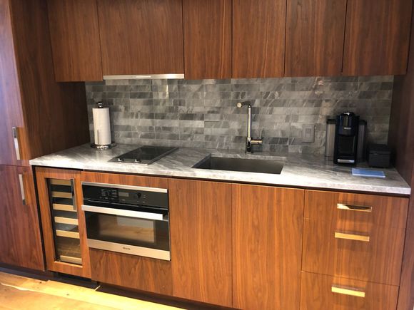 Kitchenette with wine cooler and microwave/oven in our room.