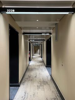 Hallway leading to room.