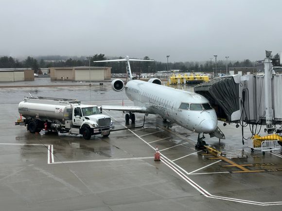 My CRJ-900 at the gate at MHT