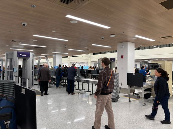 One metal detector shared by both Clear and PreCheck. This is looking back towards the belt after exiting the WTMD.