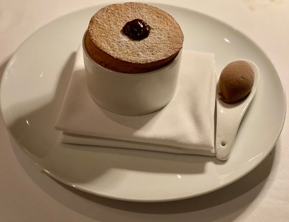 Plum Armagnac soufflé with chocolate ice cream