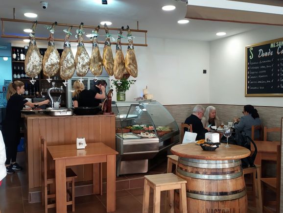 Another tapas bar, with the hams lined up over the bar