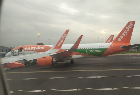 Collection of easyJet planes on the runway at BFS; on the departure screens there were none of the traditional airlines 