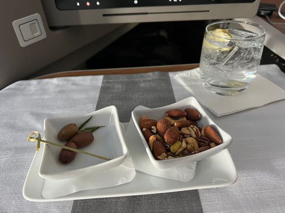 Good nut combo, high number of pistachios, salty olive offering, I miss the marinated cheese antipasto 