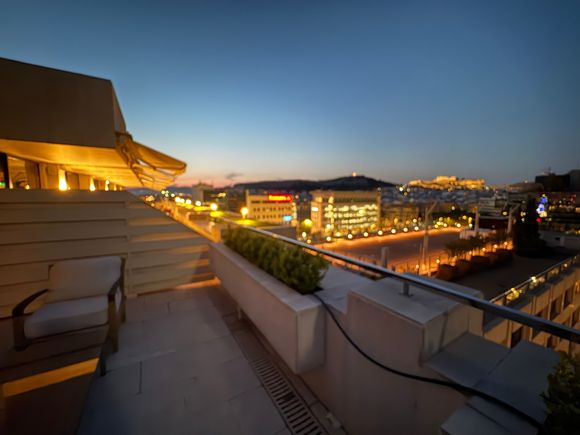Looking from the balcony to the left at the Club Intercontinental terrace and the Acropolis.