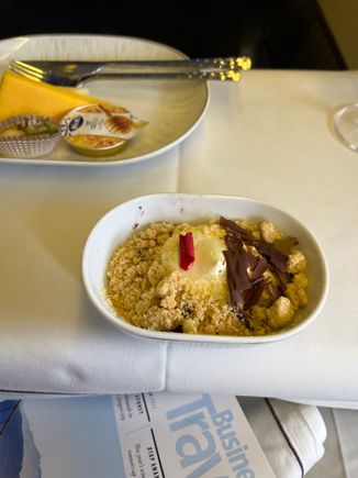 Some sort of crumble, texture of pear and colour of beetroot.