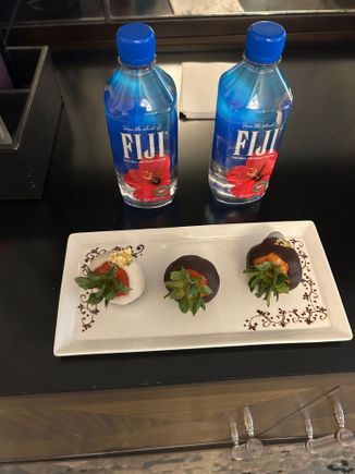 JW Marriott Essex House - chocolate covered strawberries & fancy water. This may have actually been arranged by one of the servers in the club lounge so may not qualify as a welcome amenity.
