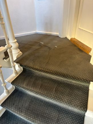 Stairway carpet is a mess