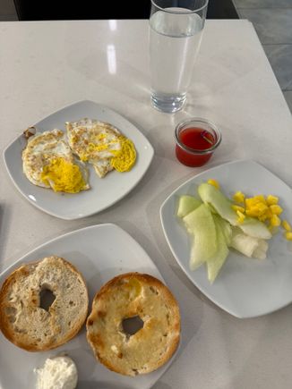 Skipped the bad plane breakfasts that come out of South America. Instead had two eggs made to order in the MIA Flagship Lounge and the mediocre bagel, but I love a bagel and egg breakfast so all good. Fruit selection was limited but the honeydew and mango was good. The watermelon ginger wellness shot was a nice touch. Also had a black coffee that wasn't a good batch. Then a nice shower. (I will usually opt for a long layover if there's a Flagship lounge - no regrets on that choice.)