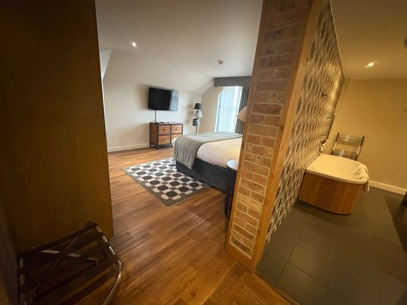 But beware there is no seperation between the bathroom and living room, so don't forget to dry your feet before slipping on the wooden floor....