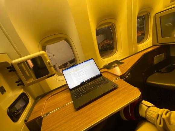 Working on the trip report lol. The chair turns over to face the windows, making it an excellent desk.