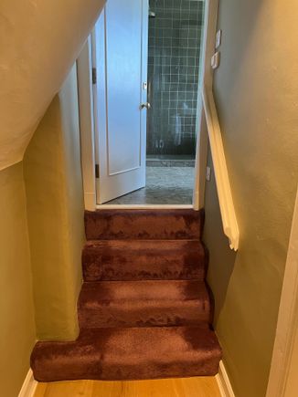 Duplex suite had strange stairways and older carpet