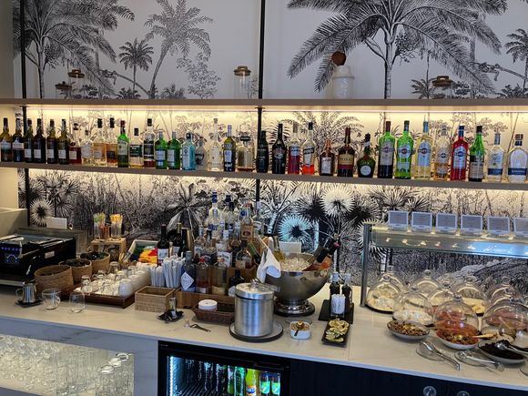 Huge alcohol selection in the club lounge.