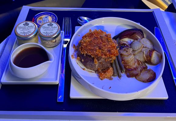 Beef with sundried tomato crumble, glace sauce, anna potatoes, and green beans. Tasty, but too well done for me. 