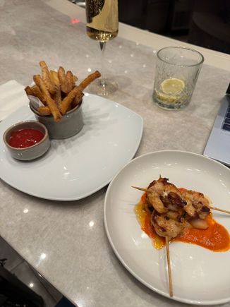 Shrimp was presented more in line with AA’s press release versus what it looked like a few weeks ago. Truffle fries were ok. 