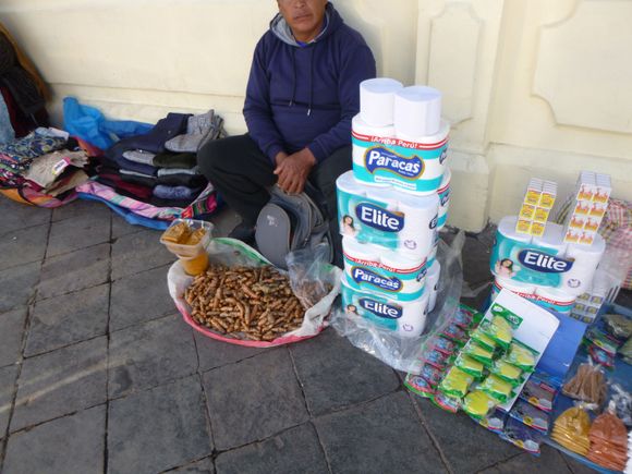 One of the traders on the footpath - among others, I think he is selling turmeric or some such product