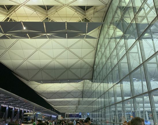 Security Checkpoint at HKG... only passengers holding boarding pass/e-ticket and valid passport are allowed to enter the terminal