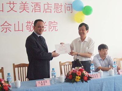 General Manager Mr. Maged Louis is accepting donating certification issued by form the Charity Foundation of Shanghai Song Jiang branch.