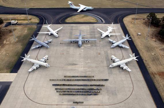 The Australian Defence Force released a group photograph of all the air crews and officials who took part in the aerial search for MH370.