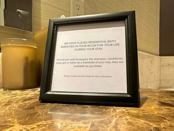 The most polite "If you take the Diptyque products we'll charge you" note I've ever seen