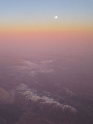 Full moon at dawn over northern Algeria.