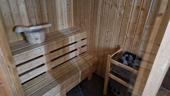 Some rooms feature a private sauna.