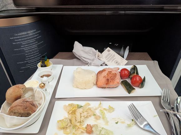 Salmon was uninspiring but acceptable. Larger portion than what I had on the ex-YUL flight last year but very comparable quality. Sides were fine. I was seated in 1A so entree came out quite quickly.
